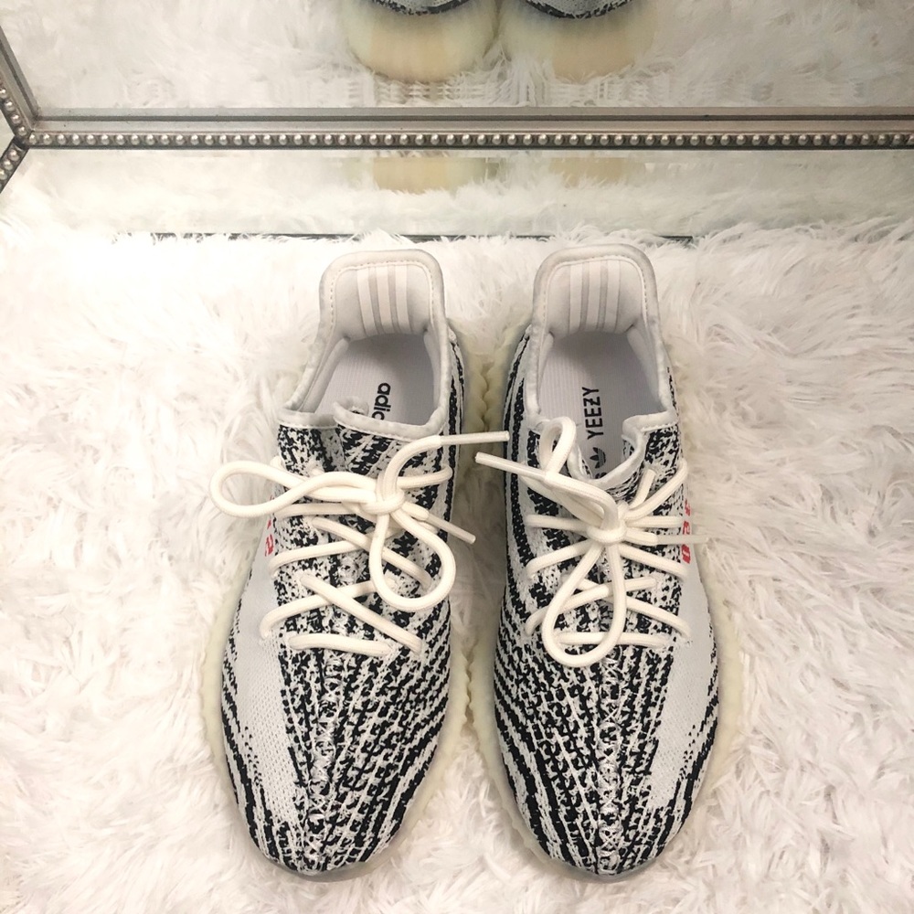 Black and white Adidas’ Yeezys